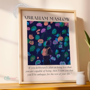 Puede incluir: Una impresión enmarcada con una cita de Abraham Maslow. La cita dice: "Si deliberadamente planeas ser menos de lo que eres capaz de ser, entonces te advierto que serás infeliz por el resto de tu vida." El fondo de la impresión presenta un diseño abstracto colorido.