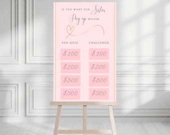May include: A pink and gold sign with the text "If you want our Sister Pay up Mister" and a heart shape. The sign has a pop quiz and challenge section with dollar amounts listed: $100, $200, $300, and $500.