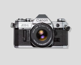 Canon AE-1 + Lens - Tested and working - Vintage 35mm film SLR analog camera with 50mm lens