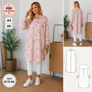 Peut inclure: Une robe chemise à manches longues boutonnée avec un motif à rayures verticales roses et blanches agrémenté de petites fleurs. Le vêtement présente un col, des poignets boutonnés et un ourlet arrondi, illustré avec un dessin technique.