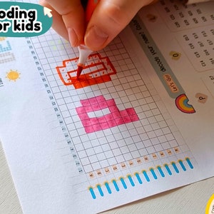 May include: A coding activity for kids featuring a grid with letters and numbers. The grid is partially filled in with orange and pink squares, forming the letters "DE". The instructions say "Let's Go! Decode your name! Color".