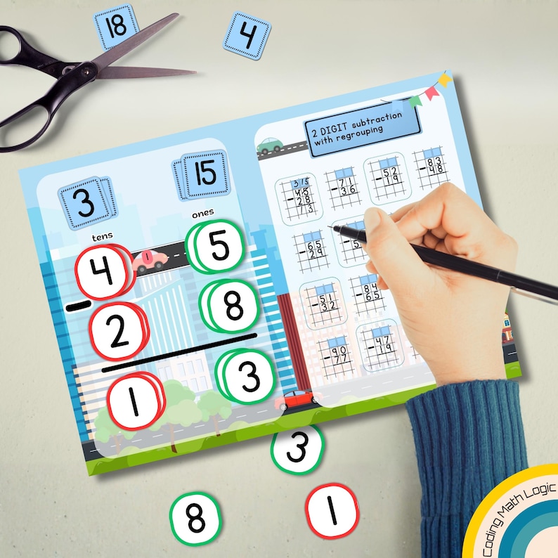 May include: An educational worksheet for 2-digit subtraction with regrouping. The worksheet has a cityscape design with cars and numbers. A hand is holding a pen, working on the math problems. There are also loose number cutouts and scissors.