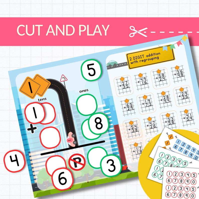 May include: A colourful educational worksheet with the text "CUT AND PLAY" and "2 DIGIT addition with regrouping". The worksheet features addition problems, a road-themed addition layout, and number cards for learning.