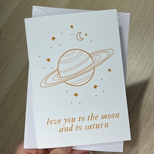Biglietto d'auguri - "ti amo fino alla luna e a Saturno" - Biglietto d'amore piegato con testi di canzoni popolari sette