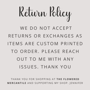May include: A cream-colored sign with the words "Return Policy" in elegant black script. The text below states that returns and exchanges are not accepted as items are custom printed to order. The sign also includes a thank you message.