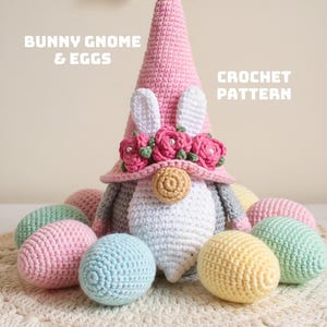 May include: A crocheted Easter gnome with bunny ears, a pink hat, and a floral crown, surrounded by pastel-colored crocheted eggs. The text "BUNNY GNOME & EGGS" and "CROCHET PATTERN" are visible. The gnome has a tan nose and a white beard.