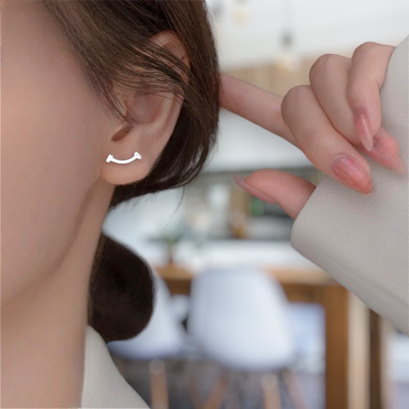 T clearance smile earrings