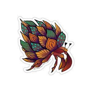 May include: A colorful sticker featuring a stylized hermit crab with a shell made of intricate, overlapping, orange, green, and blue patterns. The crab is in a walking position with its claws raised. The sticker includes the text "@imurah_the_artist" in the lower left corner.