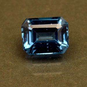 Top Blue Topaz Gemstone Certified 6.15 Ct Emerald Cut Loose Gemstone From Brazil