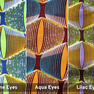 May include: Three fabric swatches with a geometric pattern of overlapping circles. The swatches are labeled "Lime Eyes", "Aqua Eyes", and "Lilac Eyes".