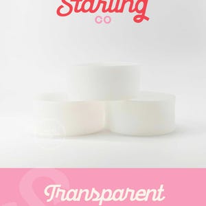 May include: Three white, round, 64 ounce transparent candle containers stacked on top of each other. The containers are on a white surface. The text "Sweet Starling Co." is at the top of the image in pink and red lettering. The text "Transparent 64 OZ" is at the bottom of the image in white lettering on a pink background.