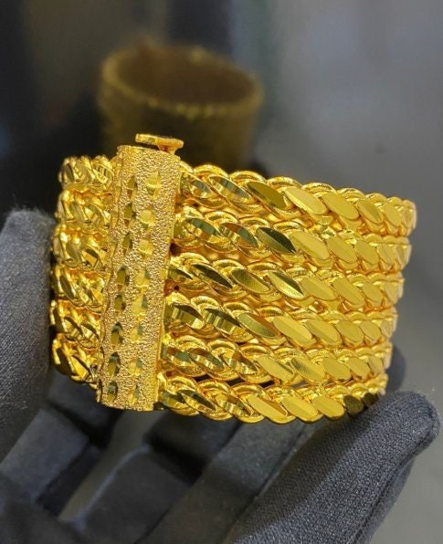 22カラットゴールドメッキツイストバングル：アダナシックス