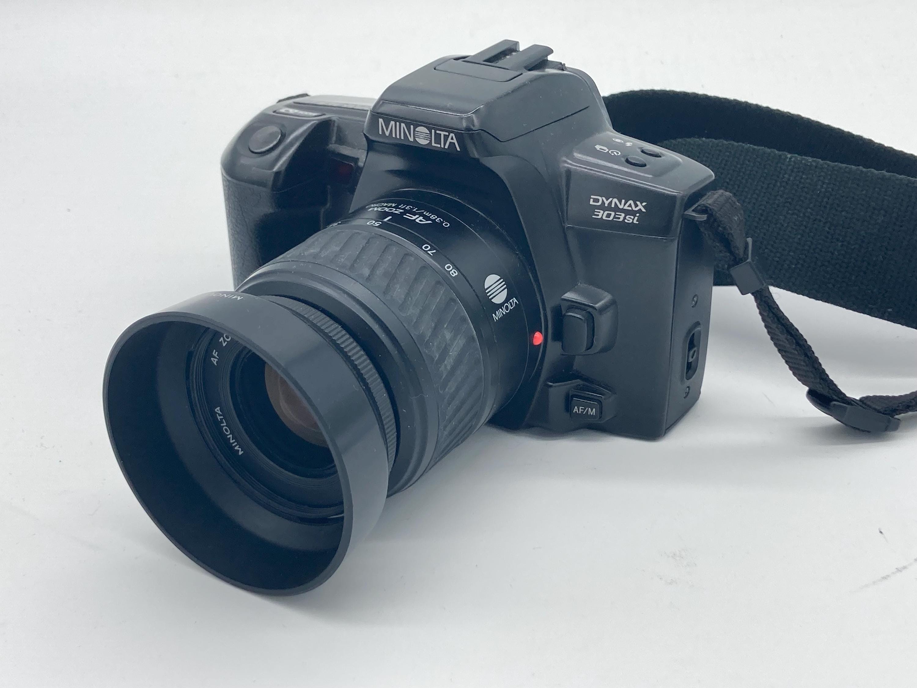 MINOLTA DYNAX 303si AF Zoom 0.38m/1.3ft Macro - 35-80mm 1:4-5.6