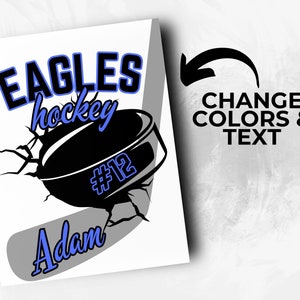May include: A white background with a black and gray hockey stick and puck. The puck has a blue number 12 on it. The text "Eagles hockey" is in black and blue. The text "Adam" is in blue. The text "CHANGE COLORS & TEXT" is in black.