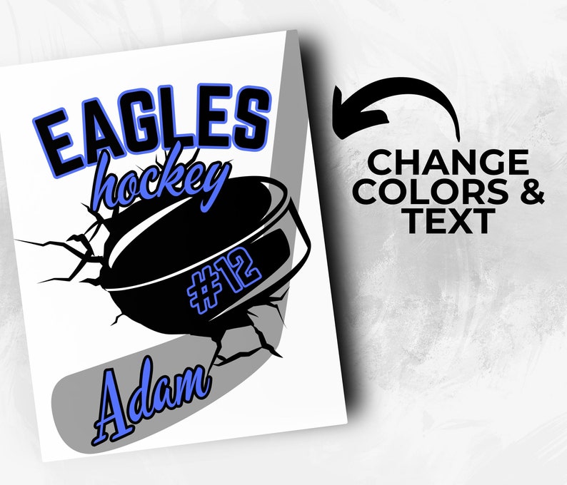 May include: A white background with a black and gray hockey stick and puck. The puck has a blue number 12 on it. The text "Eagles hockey" is in black and blue. The text "Adam" is in blue. The text "CHANGE COLORS & TEXT" is in black.
