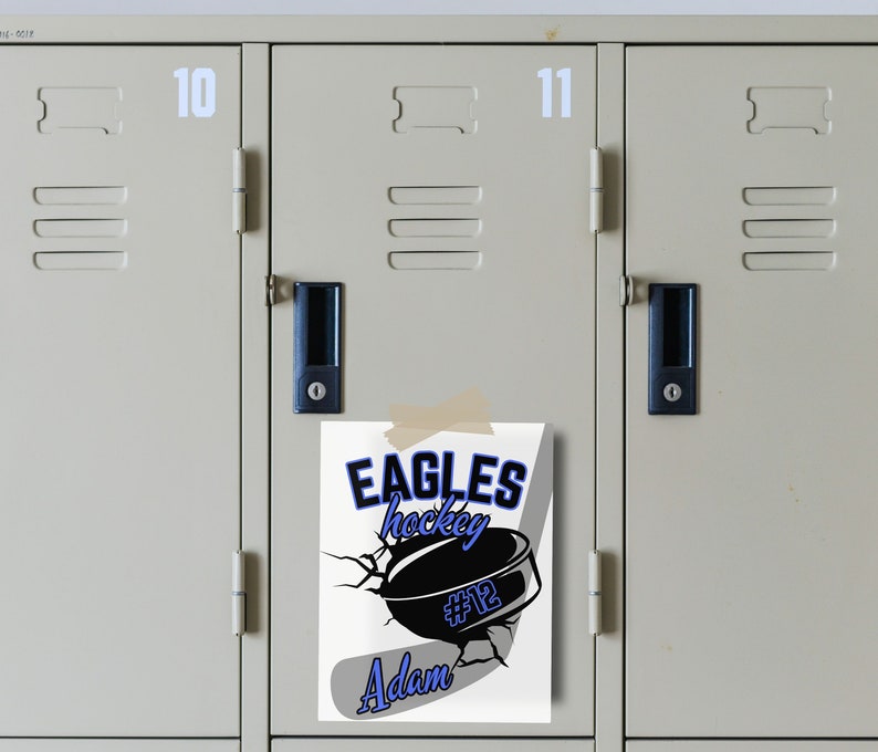 May include: A white poster with a hockey puck and stick design. The text on the poster reads "Eagles hockey #12 Adam". The poster is taped to a gray locker with the number 11 on it.
