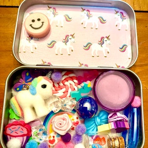Unicorn Treasure Tin Stuffed with Unicorn themed Trinkets, Suprises and Mystery Items! Makes a great gift for kids!