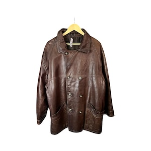 Vintage / 80's / leather / peacoat / jacket /Made in Italy / 100% leather / Brown colour / Closes with buttons / pockets