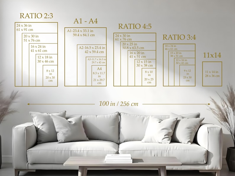 A wall-mounted display showcasing various print sizes and aspect ratios, including 24 x 36 inches, 20 x 30 inches, and 16 x 24 inches. The text "RATIO 2:3", "A1-A4", "RATIO 4:5", "RATIO 3:4", and "11x14" are visible. A sofa and table are in the foreground.
