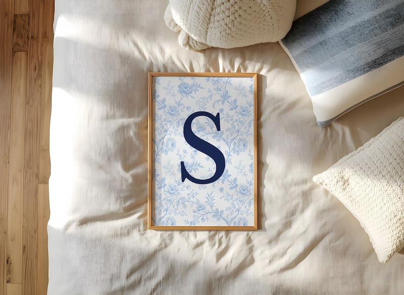Blend athletic passion with grandmillennial elegance by styling this custom college dorm gallery wall set alongside our personalized sports jersey digital downloads. This aesthetic room decor features a blue preppy university, floral initial, and state map print next to custom football posters. By combining vintage floral charm with modern polished player suite designs, you create a highly unique printable gallery wall. This bespoke artwork delivers empowering emotional utility to any apartment.