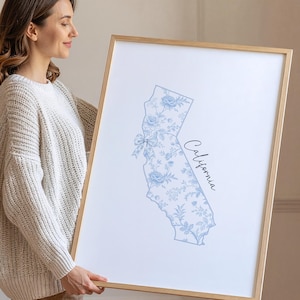 Seamlessly blend distinct aesthetics in your home styling by pairing this custom college dorm gallery wall set with our coastal cowgirl digital downloads. Imagine this blue preppy university, floral initial, and state map poster styled next to retro western cowboy boots. This printable artwork strategy beautifully captures cozy neutral Americana and grandmillennial interior design trends. Offer immense emotional utility and authentic rustic charm to your modern apartment or eclectic living room.