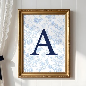 Transform your modern first apartment lounge with this stunning custom college gallery wall set of three digital download. Displaying a personalized university typography print, elegant floral initial, and a blue state map poster. This printable wall art bundle offers incredible emotional utility and captures the highly popular coastal granddaughter interior styling trend perfectly. Instantly print this bespoke artwork to infuse your chic new living space with deep gratitude and joyful memories.