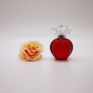 Delices (2000s) MINIATURE perfume. 5ml /0.16 fl.oz. EDT. Splash, NOT spray. **Rare and discontinued**