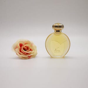 Nina Ricci in Lalique bottle MINIATURE perfume. 6ml / 0.20 fl.oz. Splash, not spray. No box! ***Collectible vintage***