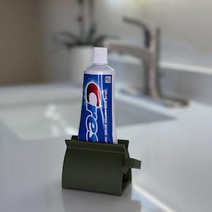 Zahnpasta Squeezer Ständer. Badezimmer Organisation.