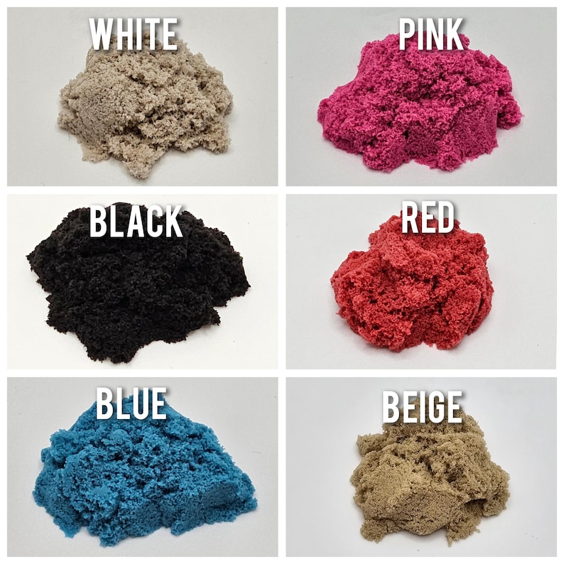May include: Six piles of kinetic sand in different colors: white, pink, black, red, blue, and beige.