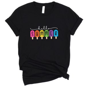 May include: Black t-shirt with a graphic of colorful popsicles and the text "hello summer" in white.