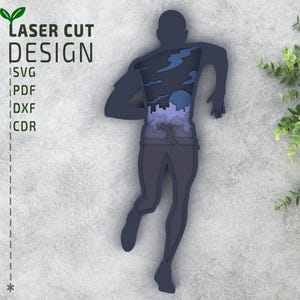 May include: Laser cut design of a running figure in shades of blue and gray, with a cityscape and clouds visible within the silhouette. The design includes the text "LASER CUT DESIGN" and file type options: SVG, PDF, DXF, and CDR.