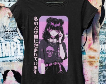 May include: Black t-shirt with a graphic of an anime girl with black hair and pink accents. The text on the shirt reads "私の心は闇に包まれています".