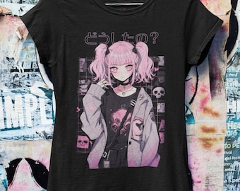 May include: Black t-shirt with a graphic print of an anime girl with pink hair and a pink jacket. The text "どうしたの?" is printed above the girl.