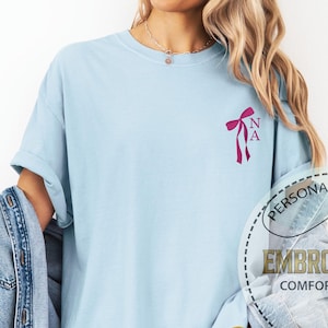 Embroidered Custom Bride Bow Shirt, Comfort Colors Coquette Bow T-shirt, Initial Pocket Tee, Bridal Party Gift,  Personalized Wedding Tee