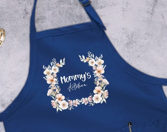 May include: A blue kitchen apron with a floral wreath design and the text "Mommy's Kitchen".