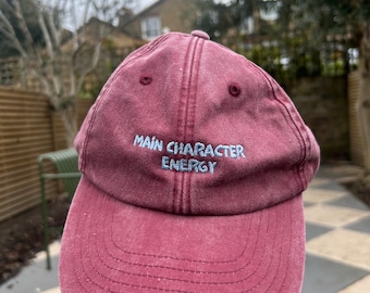 Cappellino con slogan a 6 pannelli Energy del personaggio principale