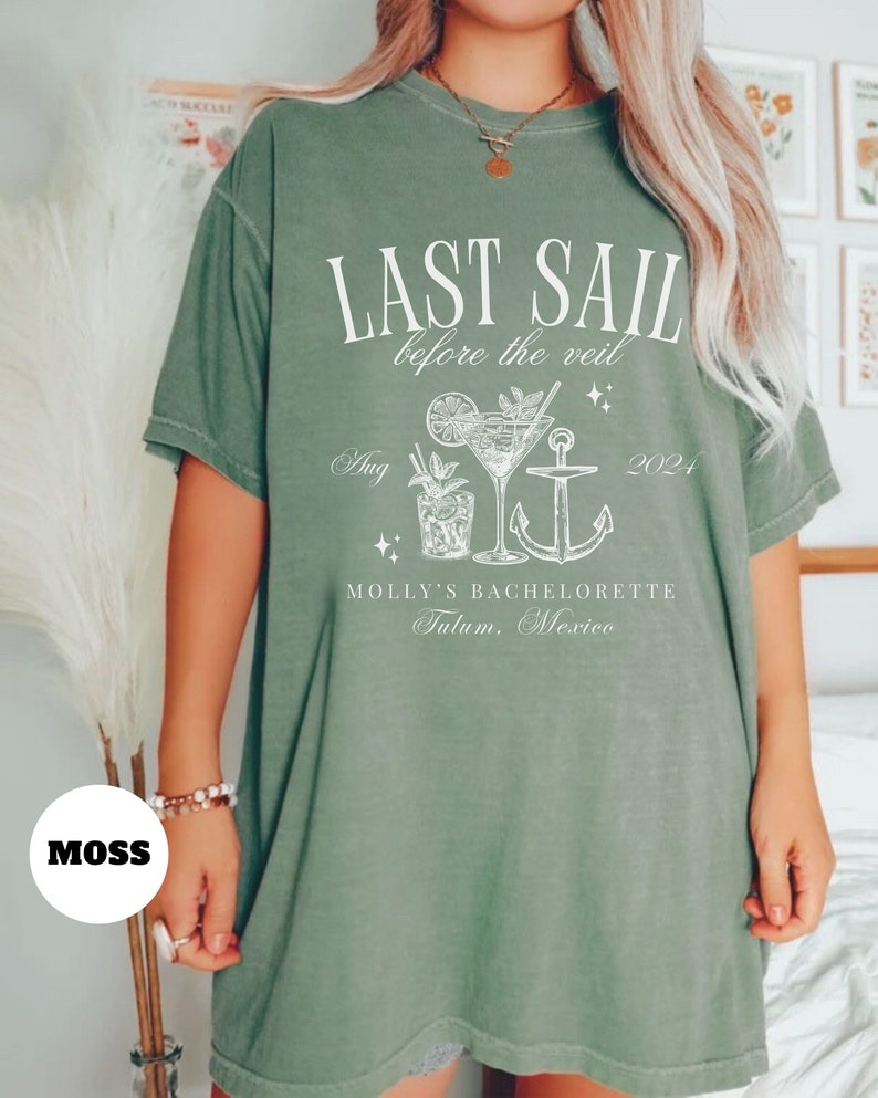 May include: Green oversized t-shirt with white text that reads "Last Sail Before the Veil" with a cocktail and anchor graphic. The text also includes "Aug 2021" and "Molly's Bachelorette Tulum, Mexico".