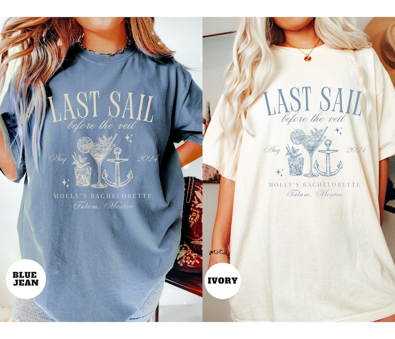 May include: Two t-shirts with a graphic design of a cocktail, anchor, and the text "Last Sail Before the Veil" in a light blue color. The text "Molly's Bachelorette Tulum, Mexico" and "Aug 2024" are also included in the design. The t-shirt on the left is blue jean and the t-shirt on the right is ivory.