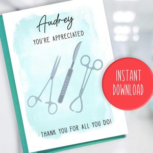 May include: A light blue card with a watercolor background and the text "Audrey You're Appreciated" in black. The card features three medical instruments: a scalpel, a pair of forceps, and a pair of scissors. The text "Thank you for all you do!" is printed in black at the bottom of the card.
