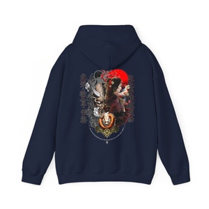 May include: Navy blue hooded sweatshirt with a graphic print of a woman in a traditional Japanese kimono, a red sun, and Japanese characters. The characters read "北大西洋"