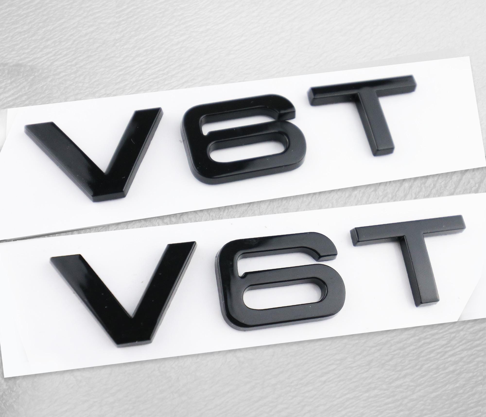 thumbnail image 2 of 2x Audi Gloss Black V6T Side Fender Marker Emblem Badge - OEM ABS, Self-Adhesive 2 of 6