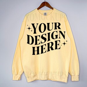 Butter Comfort Colors Sweatshirt Mockup Front Comfort Colors 1566 Mock Up C1566 Crewneck Sweatshirt On Hanger
