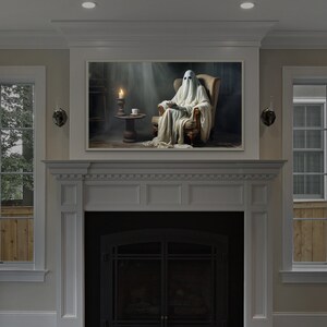 May include: A white ghost figure sits in a chair reading a book in a dimly lit room. The ghost is wearing a white robe and has a white face. The room is decorated with a fireplace and a candle on a table.