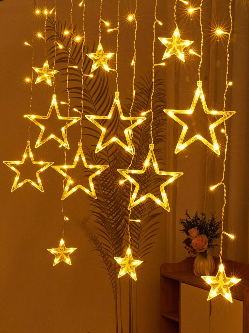 Stringa di luci a LED-Stringa di stelle-Luci da fata per decorazioni domestiche esterne e interne-Luci a sospensione a stella scintillante per l'arredamento della camera immagine 2