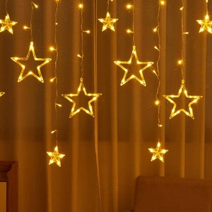 Stringa di luci a LED-Stringa di stelle-Luci da fata per decorazioni domestiche esterne e interne-Luci a sospensione a stella scintillante per l'arredamento della camera immagine 8