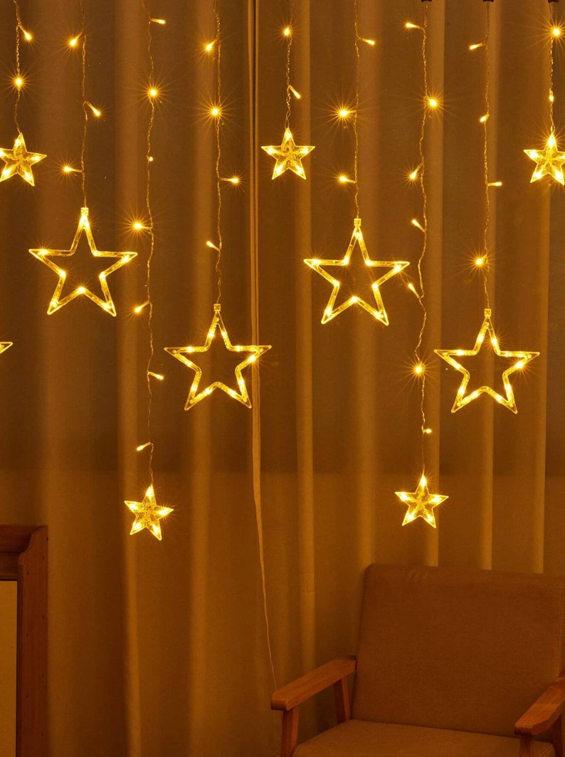 Stringa di luci a LED-Stringa di stelle-Luci da fata per decorazioni domestiche esterne e interne-Luci a sospensione a stella scintillante per l'arredamento della camera immagine 8