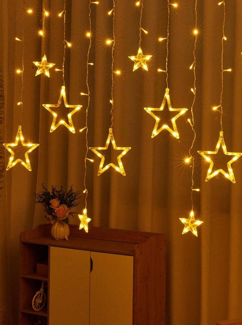 Stringa di luci a LED-Stringa di stelle-Luci da fata per decorazioni domestiche esterne e interne-Luci a sospensione a stella scintillante per l'arredamento della camera immagine 1