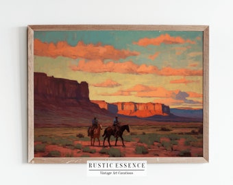 May include: A vintage painting depicting a desert landscape with two cowboys riding horses at sunset. The sky is a vibrant orange and pink, with fluffy clouds. The mountains in the distance are a reddish-brown colour. The painting is framed in a light wood frame.