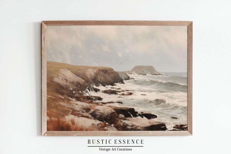 Puede incluir: Una pintura enmarcada de un paisaje mar&iacute;timo con una costa rocosa y olas rompiendo. El cielo est&aacute; nublado y el agua es de un azul gris&aacute;ceo claro. La pintura est&aacute; en un marco de madera claro.